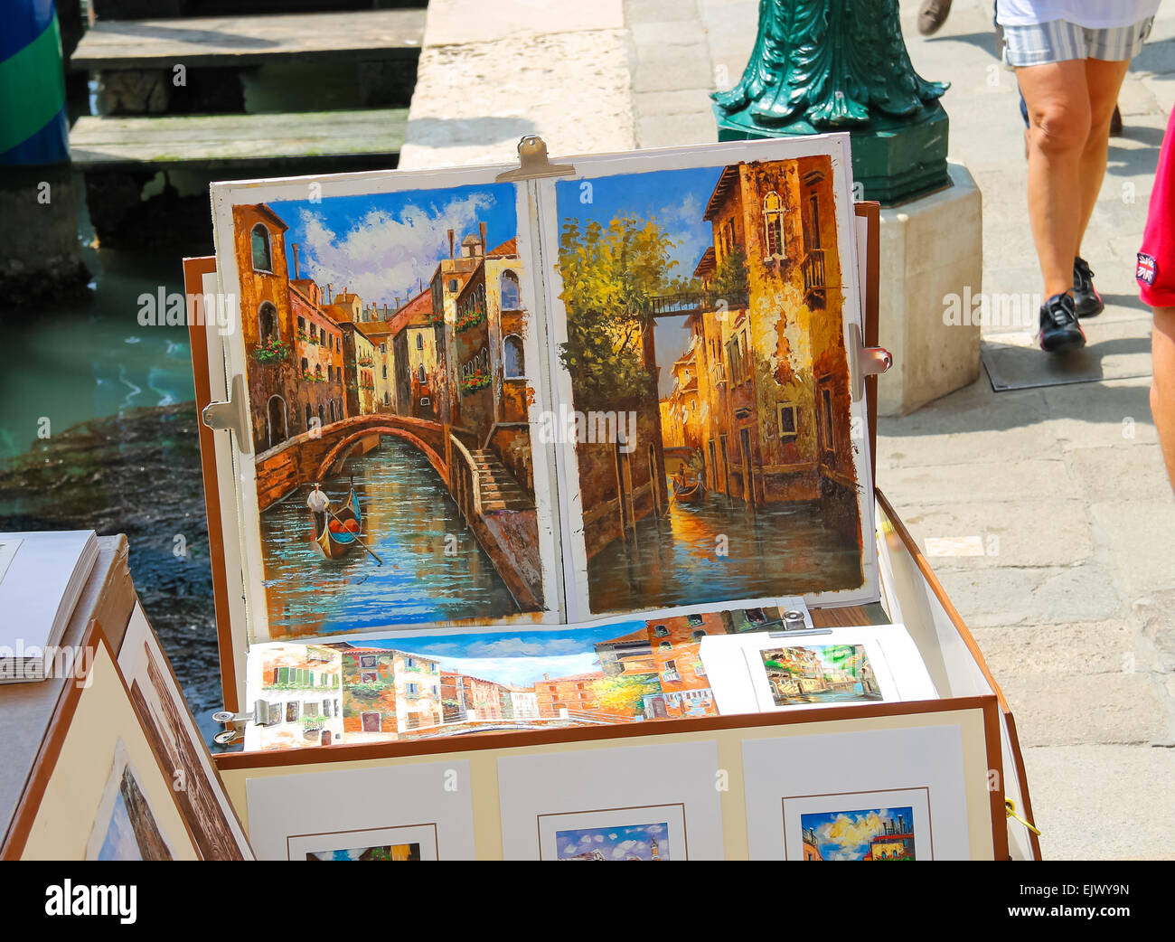 VENICE, ITALY - MAY 06, 2014: Equipment and drawings street artist in Venice, Italy Stock Photo