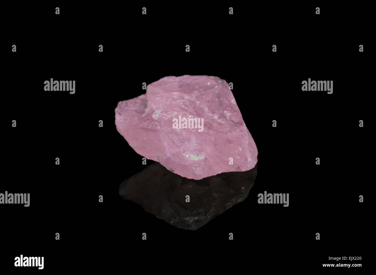 Rose Quartz on black background Stock Photo - Alamy