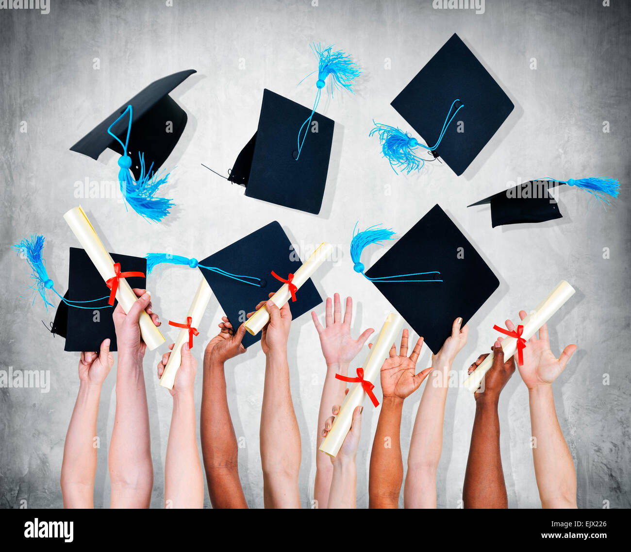 Hands shot of people celebrating their graduation. Stock Photo