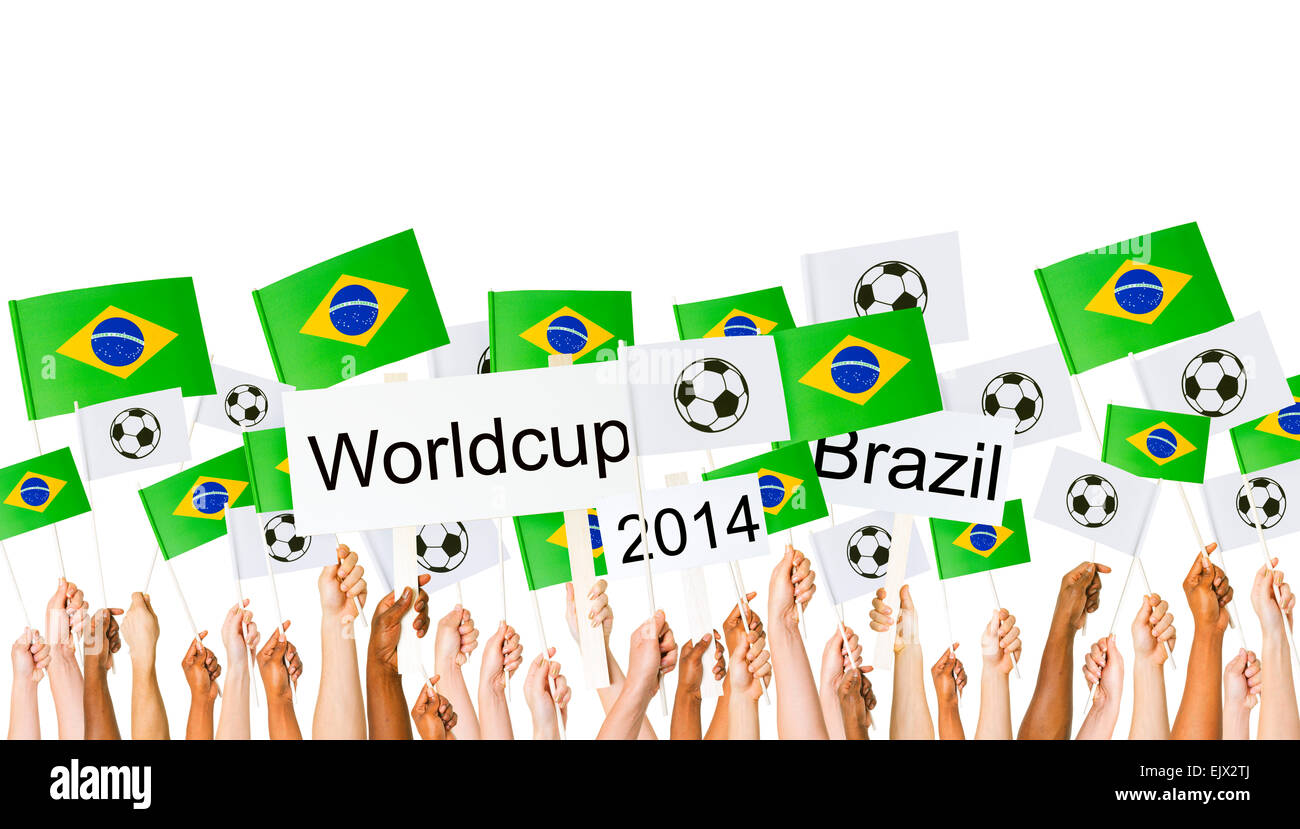 Raised Arms Holding Brazilian Flag and Banners for World Cup Stock Photo