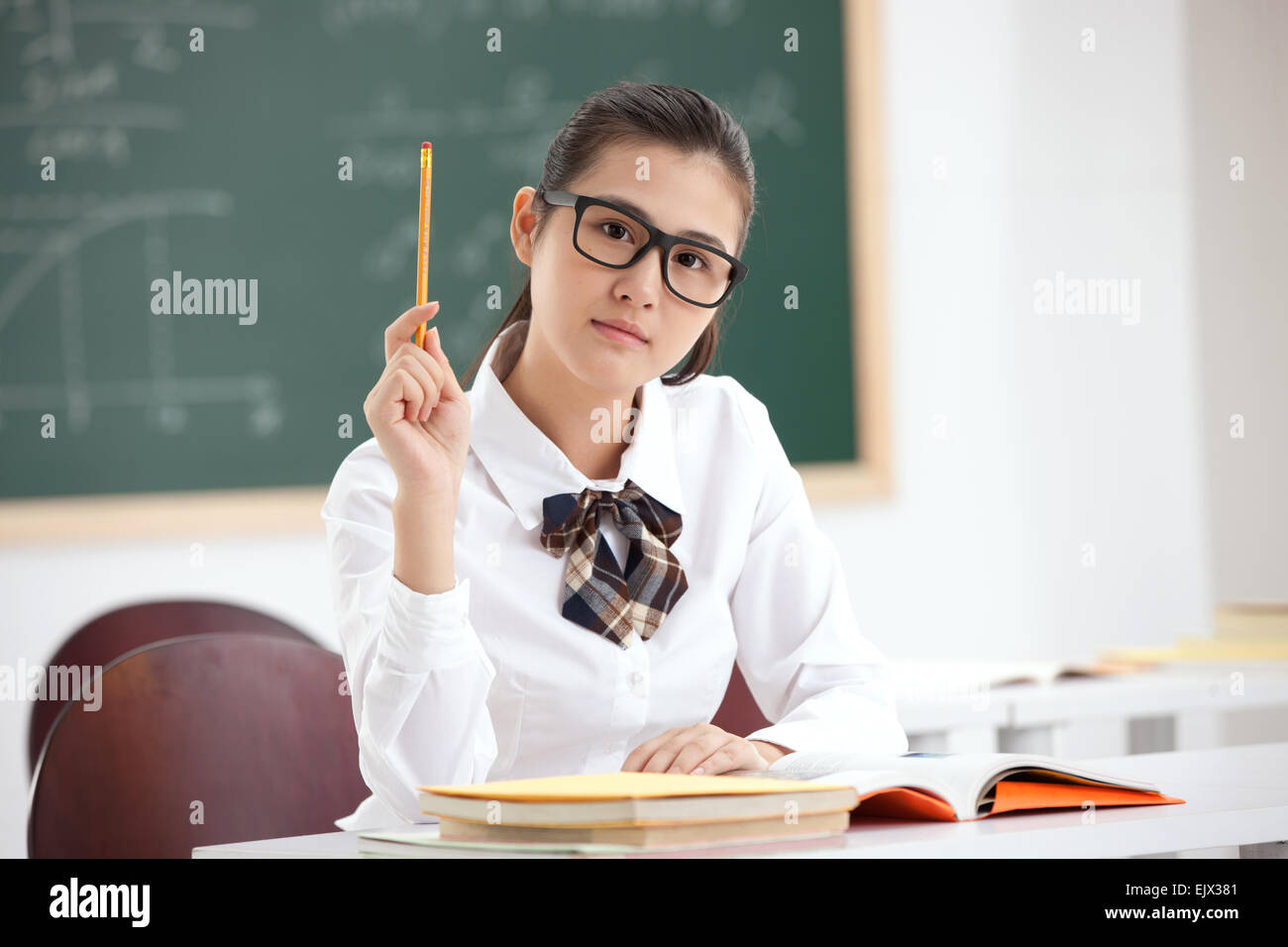 A high school student with a pencil Stock Photo - Alamy