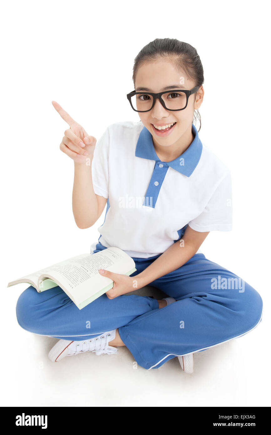 One Leg Student A high school student with a book sitting cross legged Stock Photo - Alamy