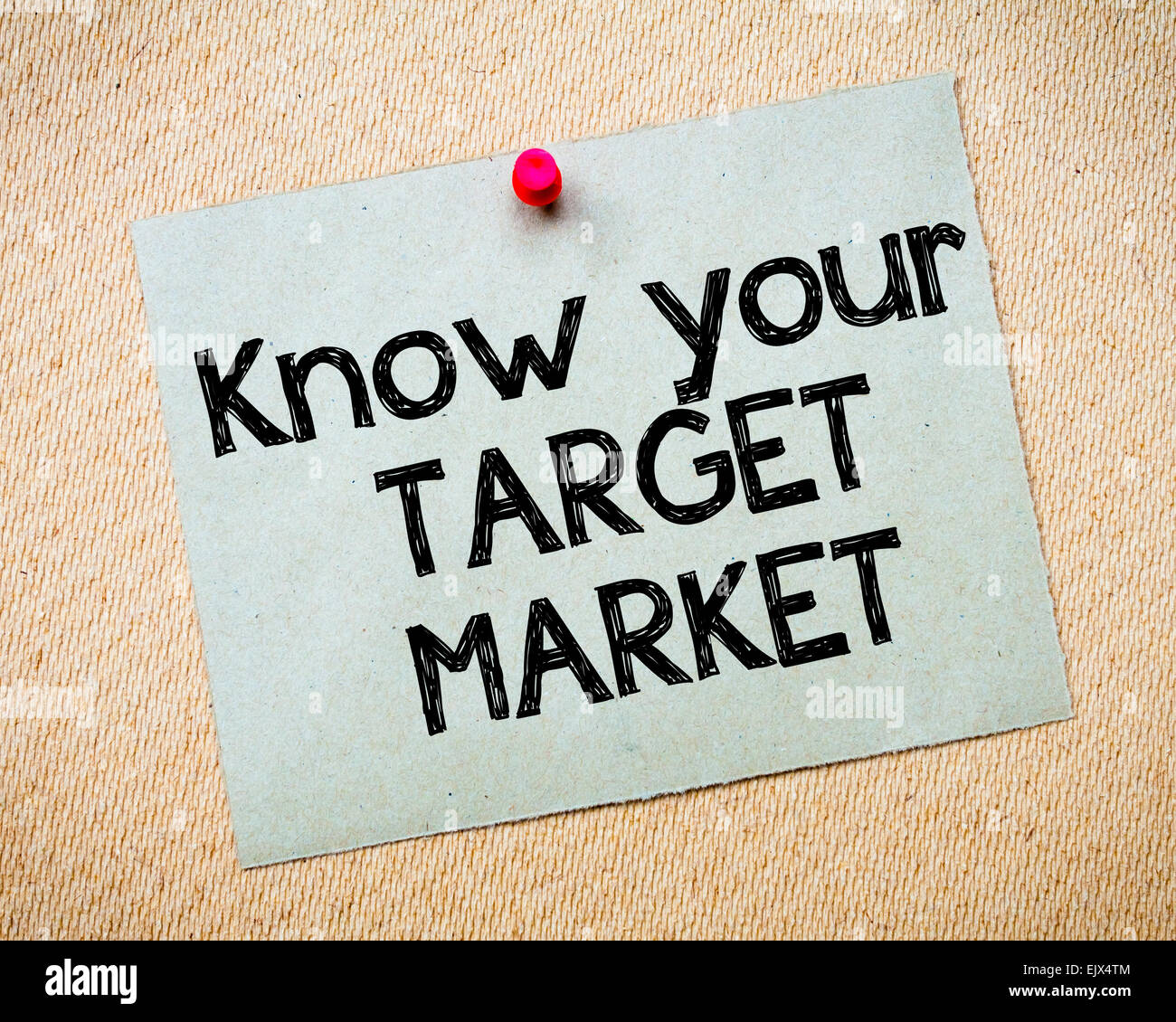 Know your Target Market Message. Recycled paper note pinned on cork