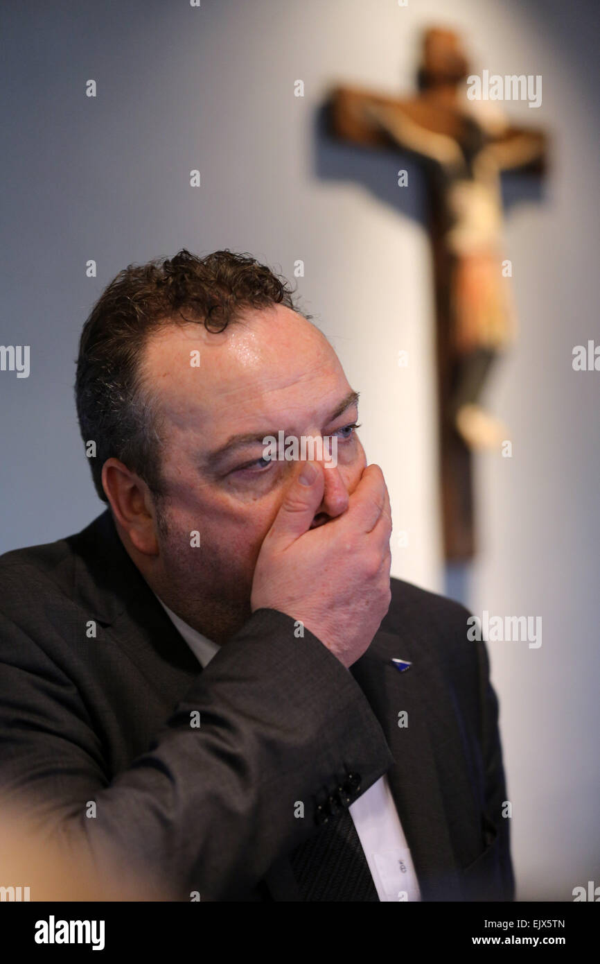 HALTERN, GERMANY - Haltern city mayor Bodo Klimpel at a press conference the day after16 students and two teachers from Joseph-Koenig-Gymnasium high school were among passengers on Germanwings flight 4U9525 that crashed in southern France on March 25, 2015. All 144 passengers and six flight crew are dead. Stock Photo