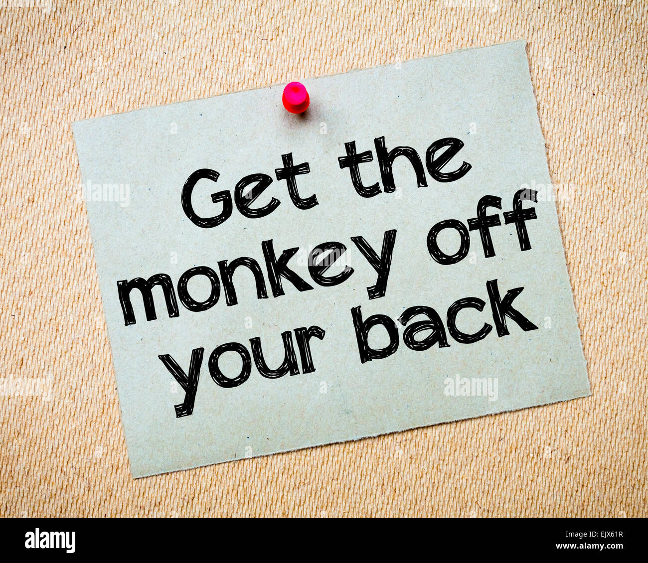 get-the-monkey-of-your-back-message-recycled-paper-note-pinned-on-cork