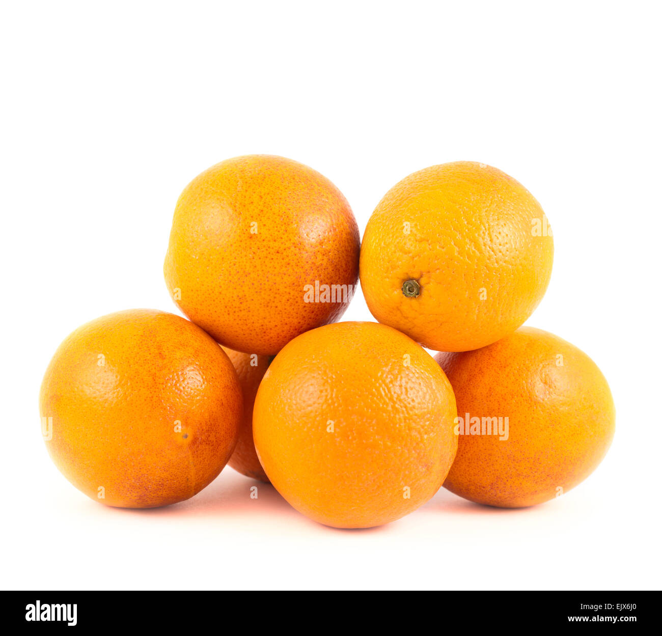 Pile of fresh oranges isolated Stock Photo - Alamy