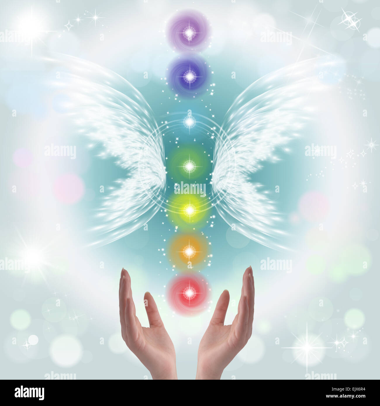 Healing Hands and seven chakras Stock Photo