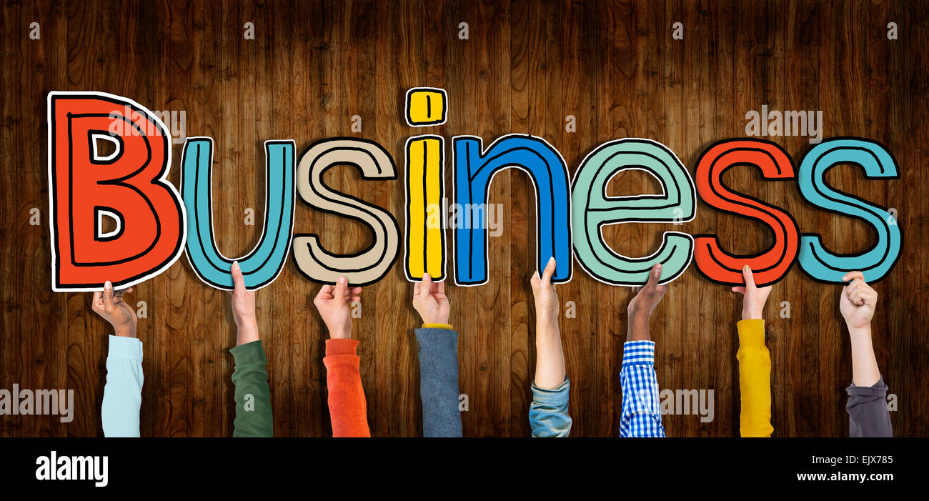 Multi ethnic Group of Hands Holding Word Business Stock Photo - Alamy