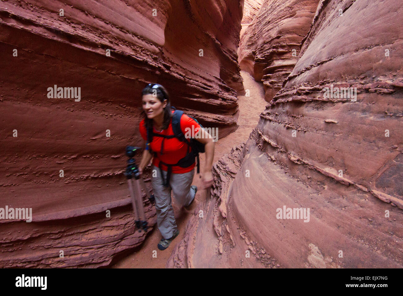 Exploring a slot canyon in Utah Stock Photo