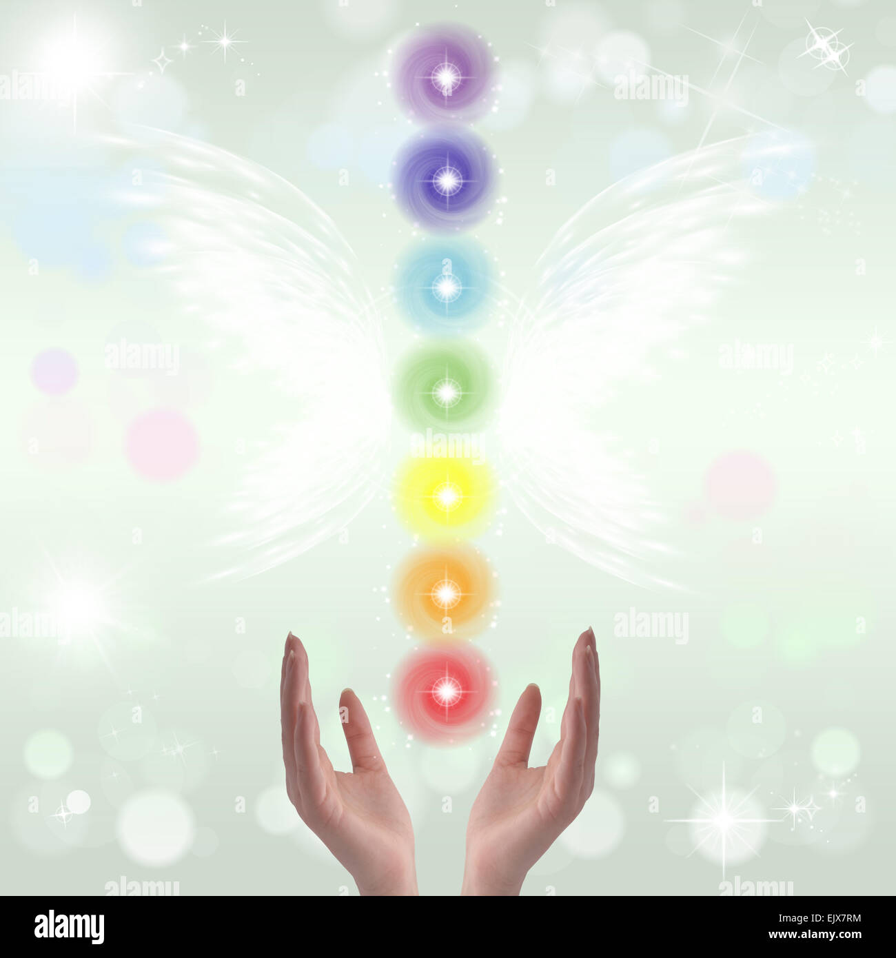 Healing Hands and seven chakras Stock Photo