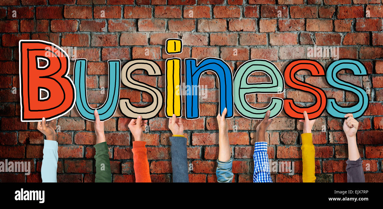 Multi ethnic Group of Hands Holding Word Business Stock Photo - Alamy