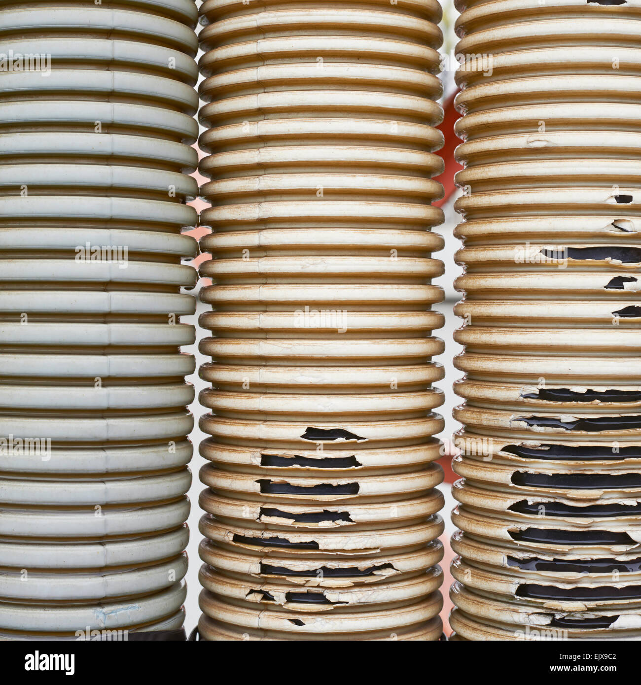 Old and threadbare plastic tubes Stock Photo - Alamy
