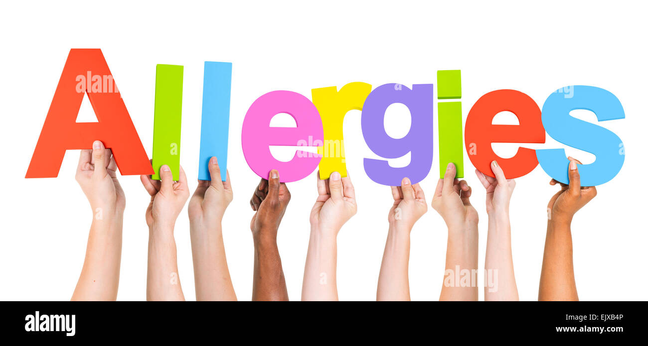 Group of Multi ethnic Hands Holding Allergies Stock Photo