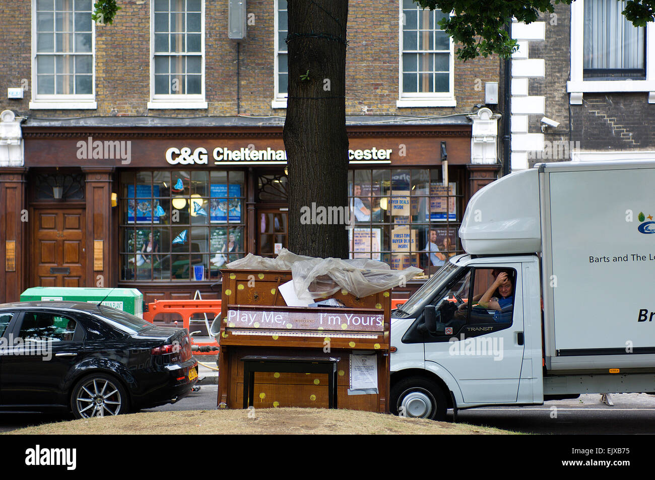 City workers have got used now to seeing pianos in the street carrying notices saying “Play Me, I’m Yours”. Stock Photo
