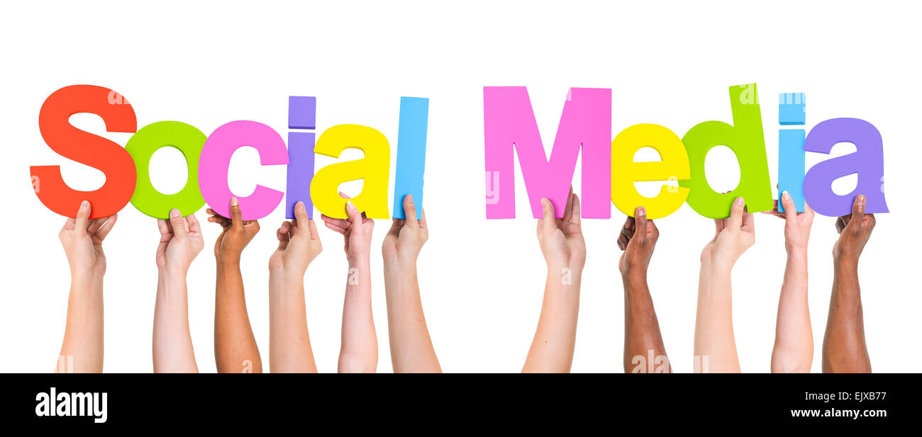 Diverse Hands Holding Social Media Stock Photo