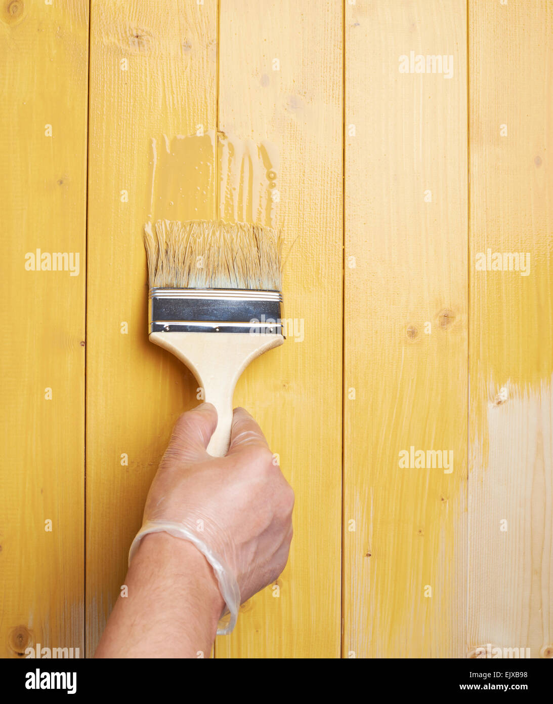 Process of painting wooden boards Stock Photo Alamy