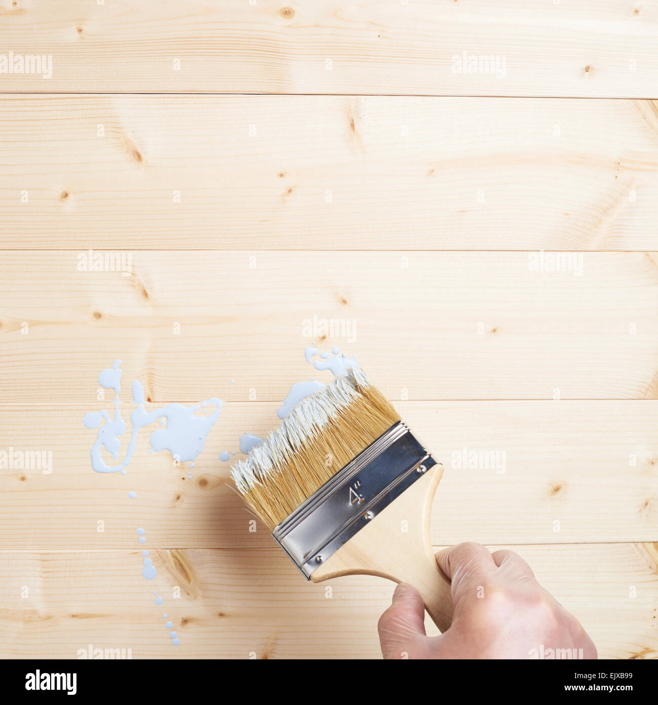 Process of painting wooden boards Stock Photo Alamy