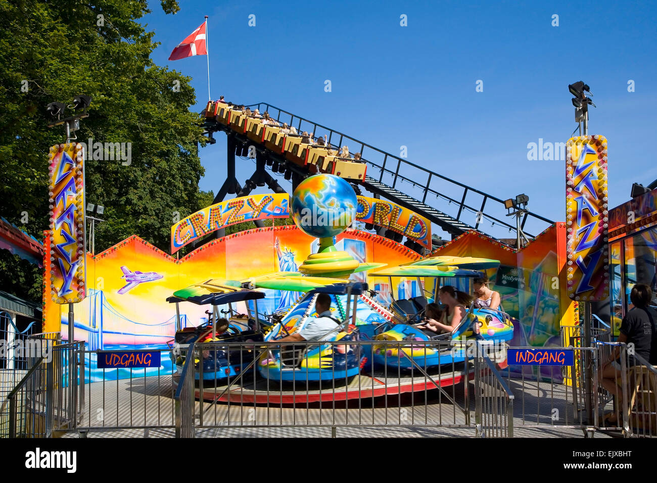 Ride on a roundabout in Bakken amusement park Stock Photo Alamy