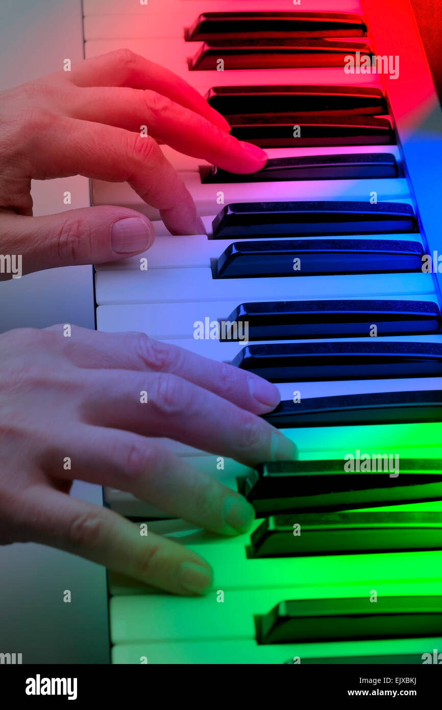 Hands on piano keys Stock Photo Alamy
