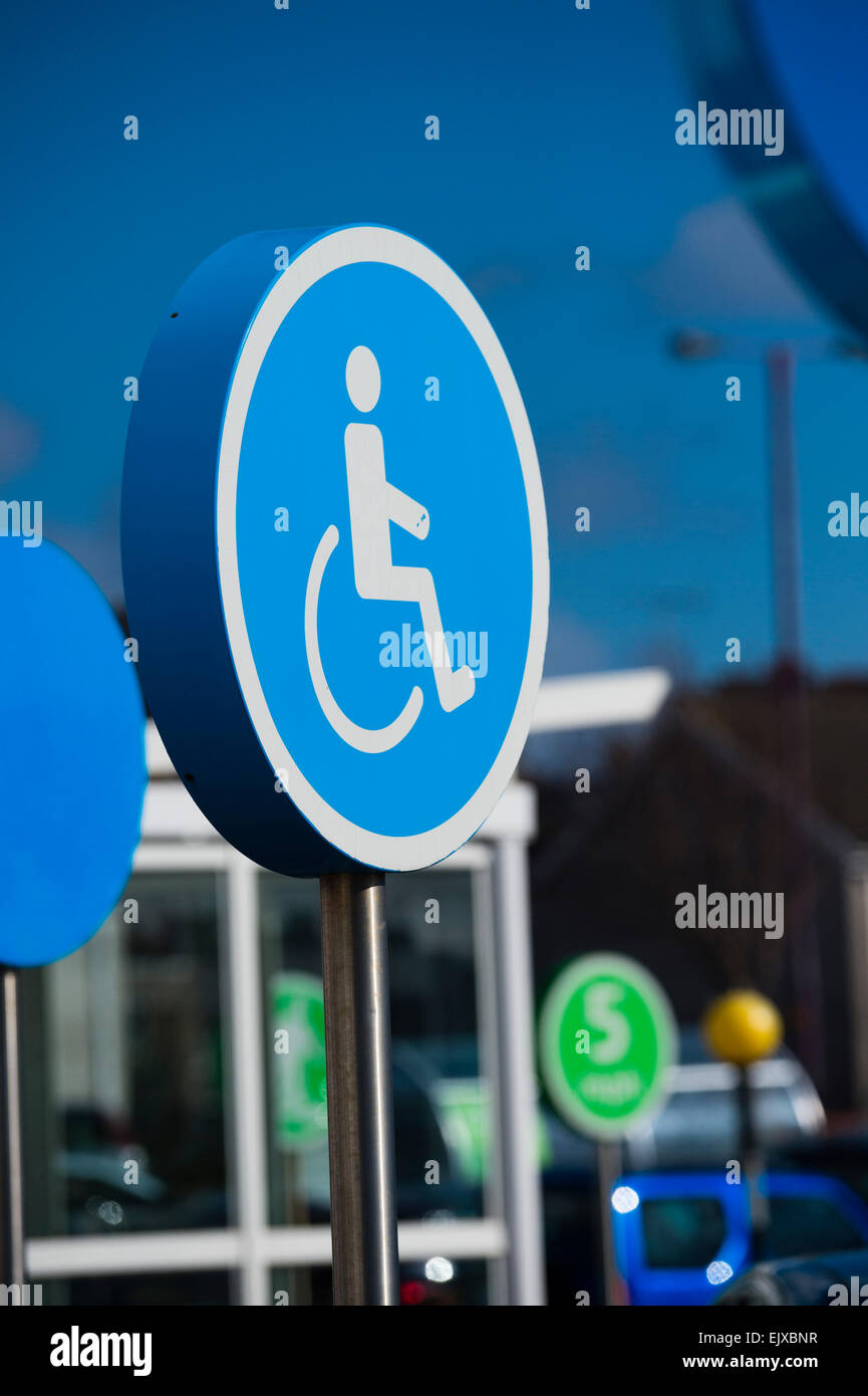 Disabled parking sign, ASDA supermarket, Llanelli town centre, Wales UK Stock Photo
