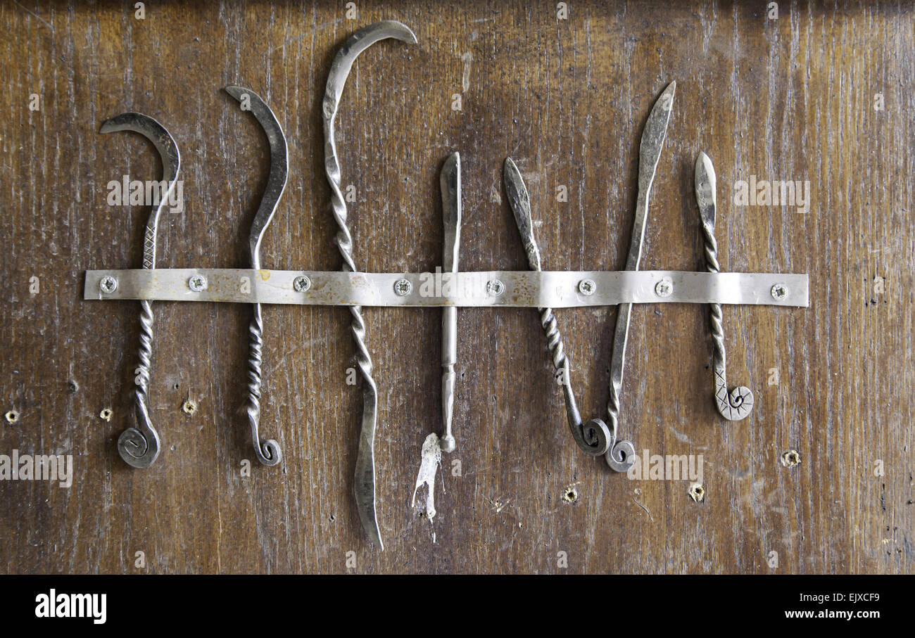 Medieval scalpels, detail of antique medical tools Stock Photo