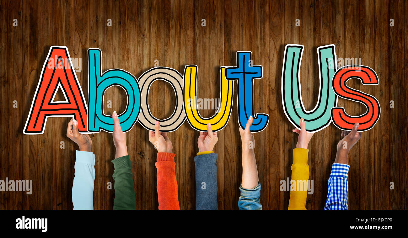 Multiethnic Group of Hands Holding Word About Us Stock Photo - Alamy