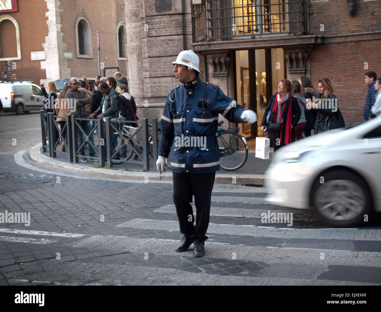 An Italian policeman controls the traffic in Rome Stock Photo - Alamy