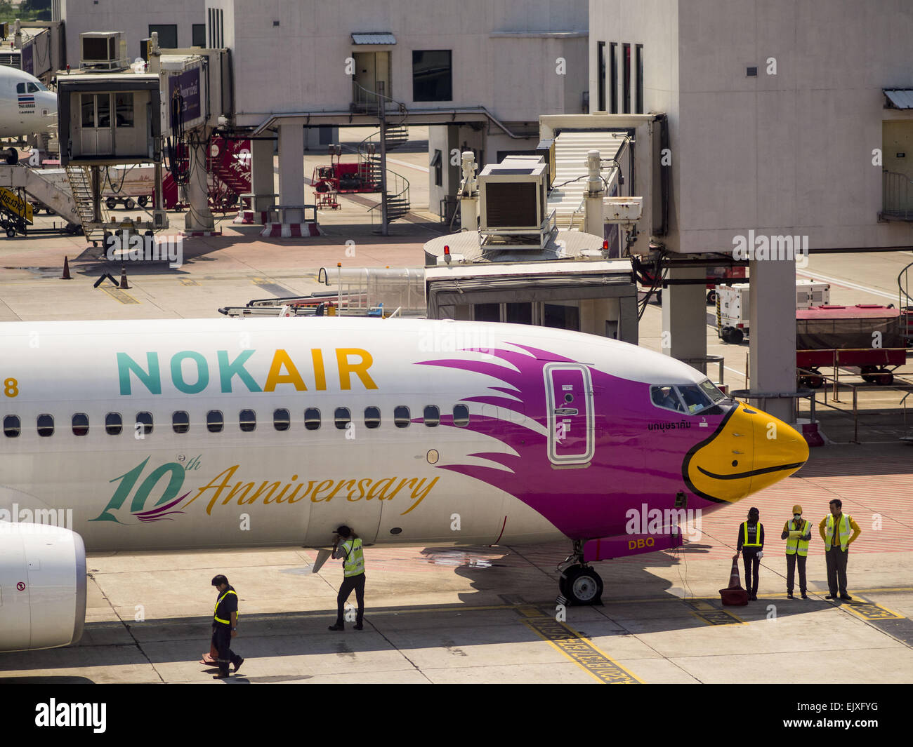 Bangkok, Thailand. 2nd Apr, 2015. A NOK Airlines Boeing 737 at its gate at Don Mueang Airport in Bangkok. The International Civil Aviation Organization (ICAO), a United Nations agency, issued a report critical of record keeping and maintenance reports for Thailand's civil aviation industry, including most Thai air carriers. The ICAO report allegedly showed that the Thai Department of Civial Aviation (DCA) was able to meet only 21 out of 100 ICAO requisites. Credit:  ZUMA Press, Inc./Alamy Live News Stock Photo