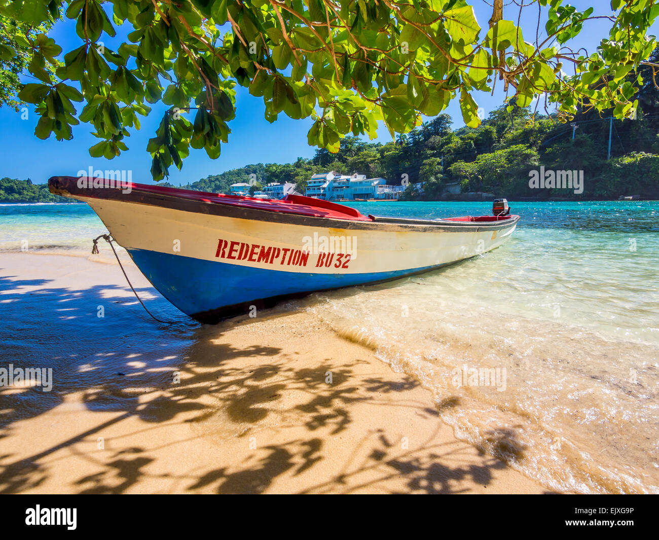 Caribbean, Greater Antilles, Jamaica, Portland Parish, Port Antonio, Pellew Island, boat at beach Stock Photo
