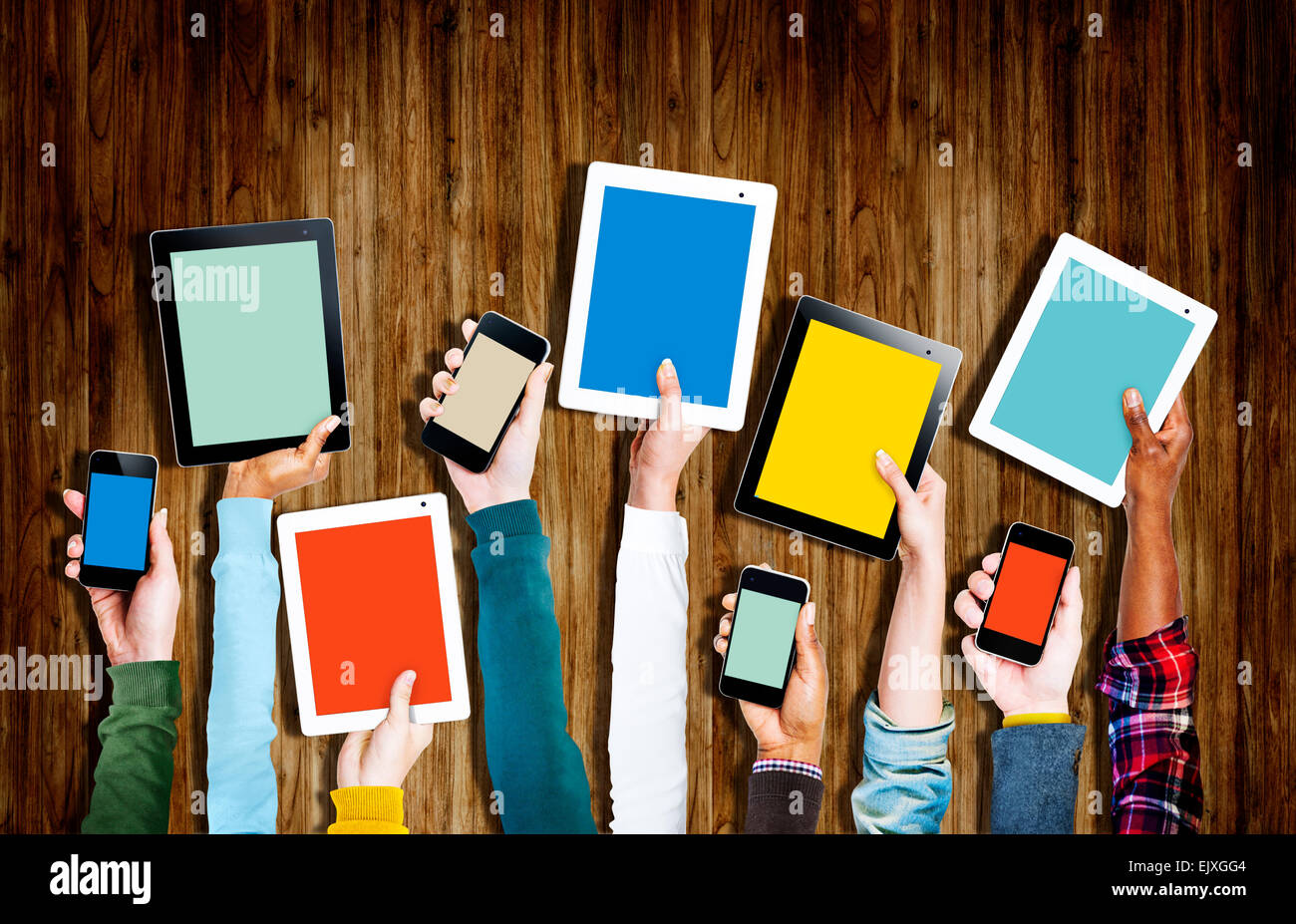 Group of Hands Holding Digital Devices Stock Photo - Alamy