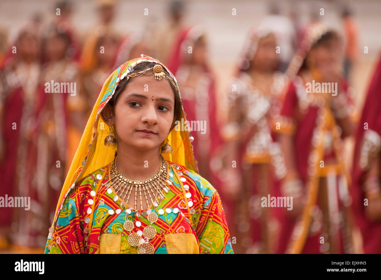 India, Rajasthan, Pushkar, portrait of young woman at camel market