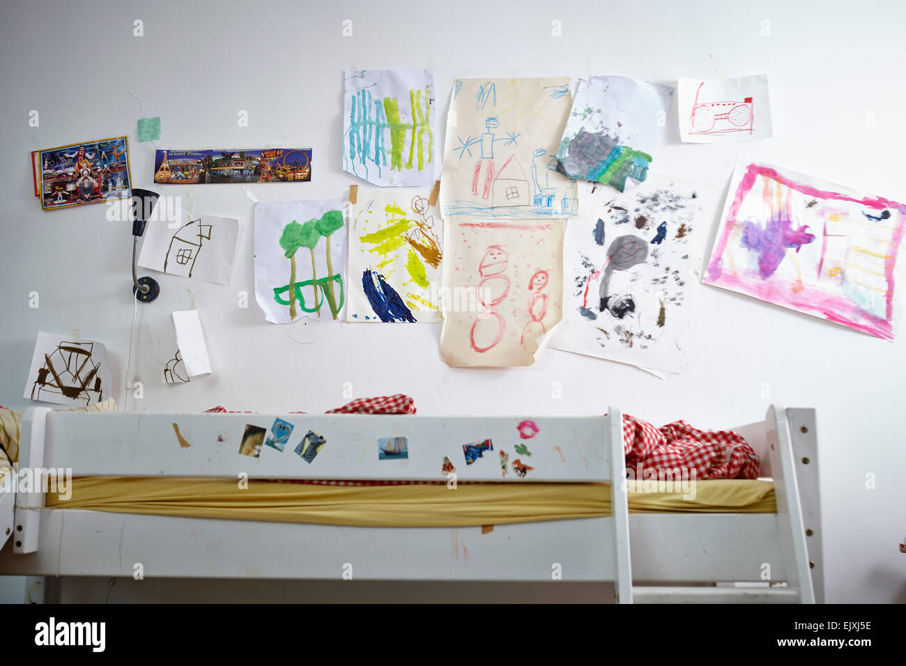Children S Drawings On Wall Over Bunk Bed Stock Photo