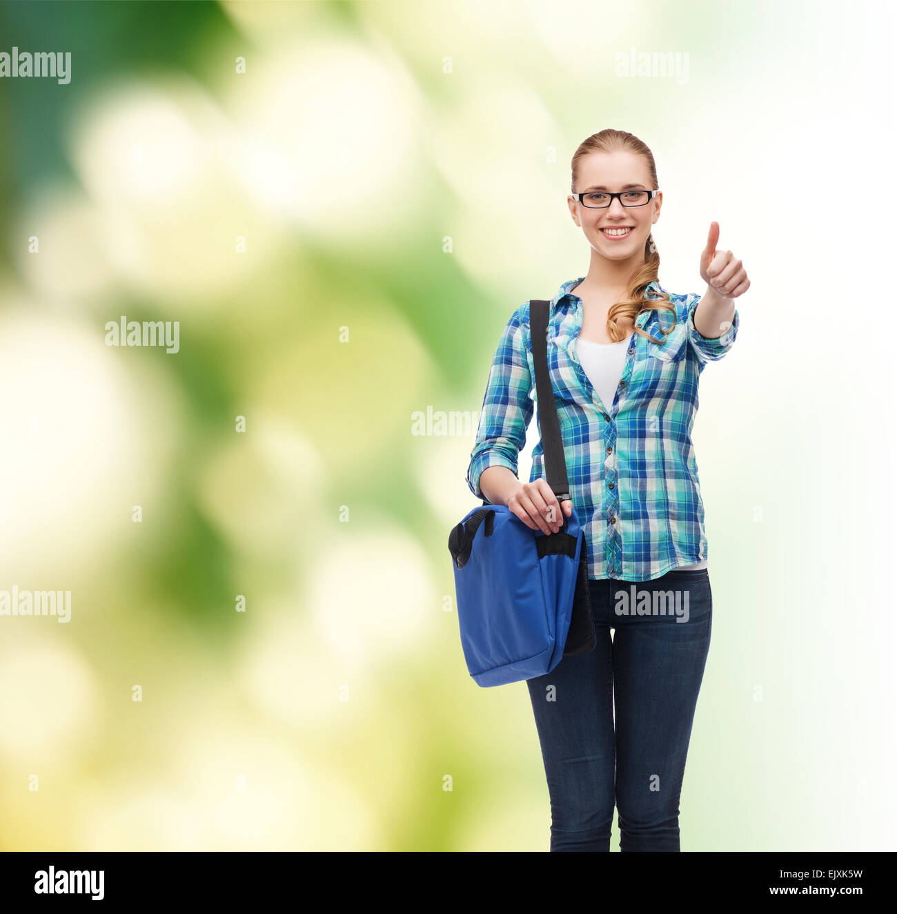 student with laptop bag showing thumbs up Stock Photo - Alamy