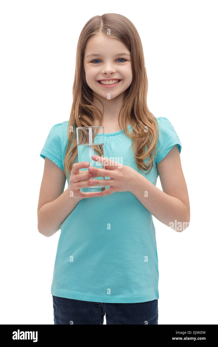 smiling little girl with glass of water Stock Photo - Alamy