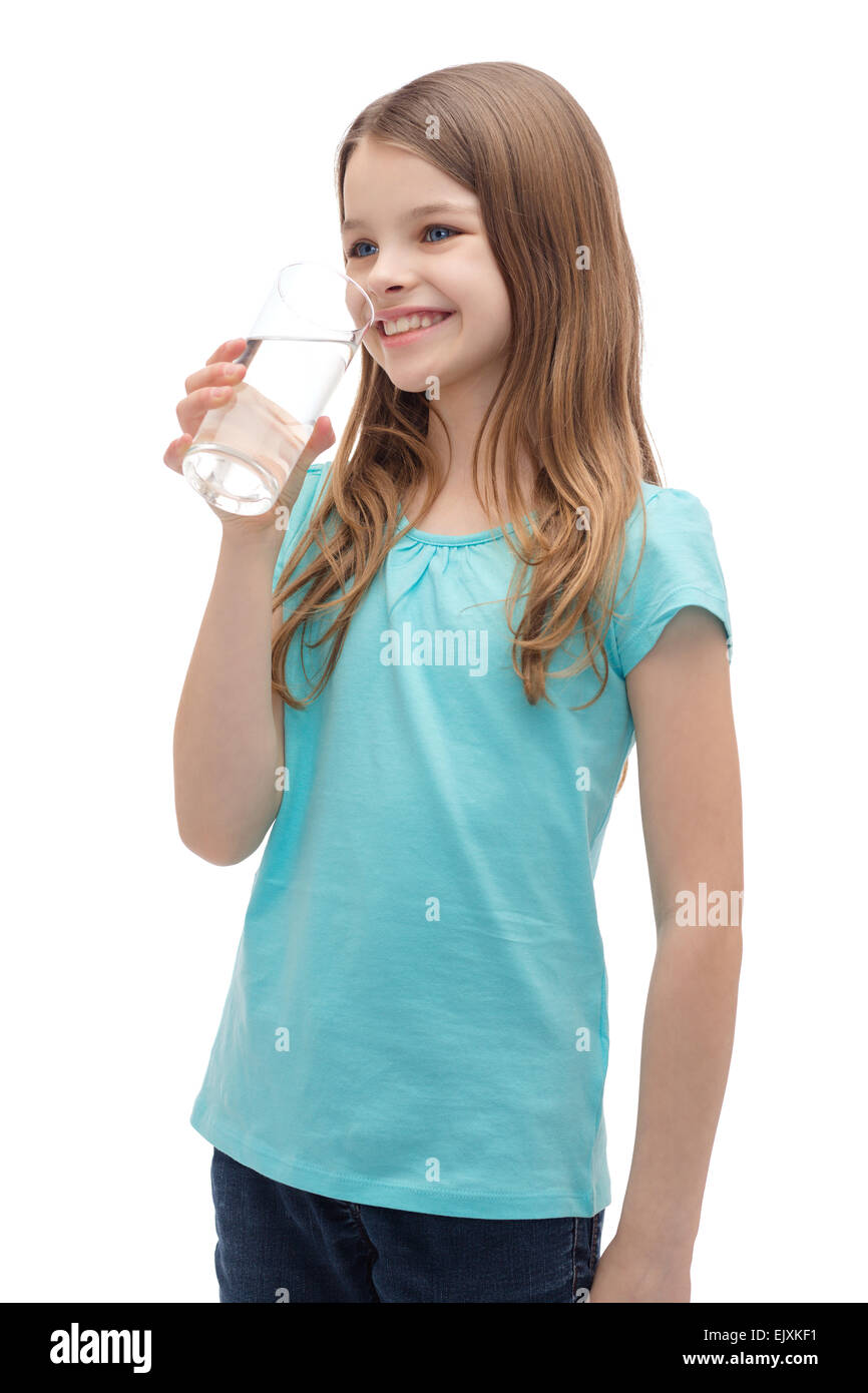 smiling little girl with glass of water Stock Photo - Alamy