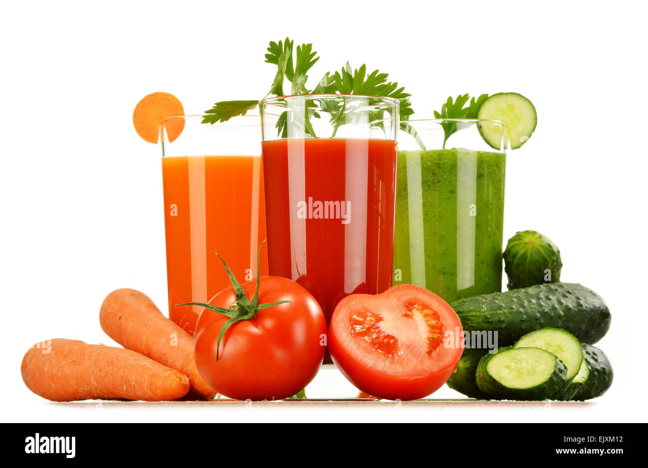 Glasses with fresh vegetable juices isolated on white. Detox diet. Stock Photo