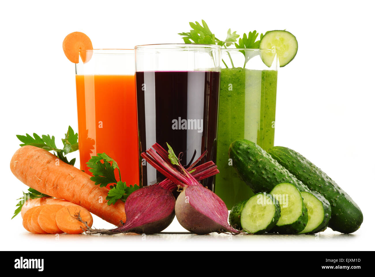 Glasses with fresh vegetable juices isolated on white. Detox diet. Stock Photo