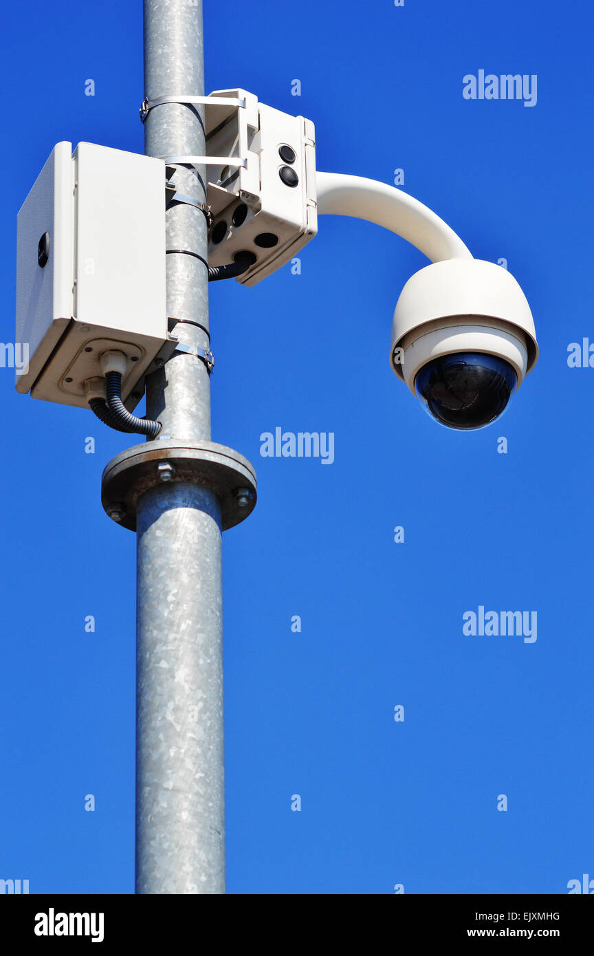 Hy Tech Camera Hi-tech dome type camera over blue sky Stock Photo - Alamy