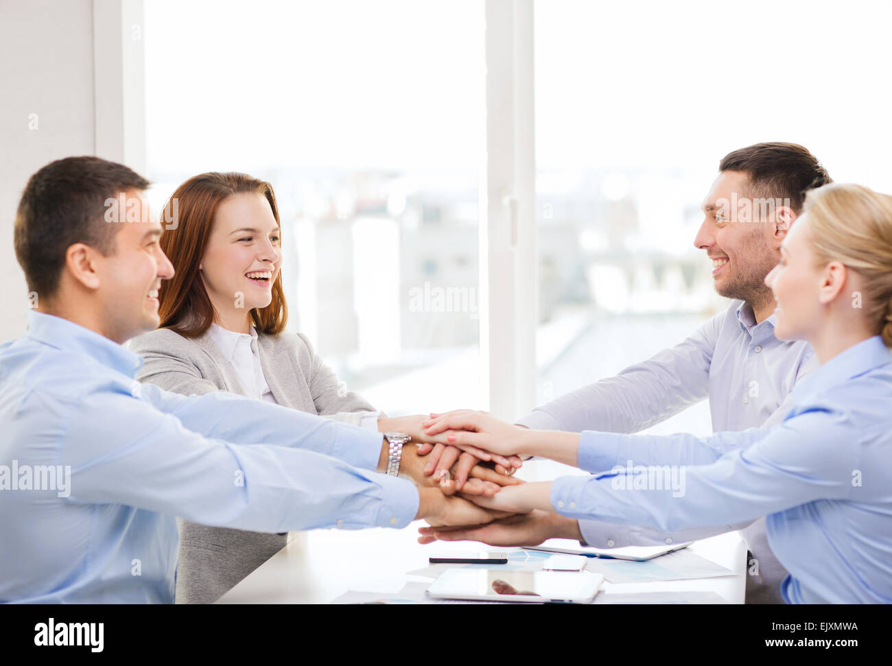 business team celebrating victory in office Stock Photo - Alamy