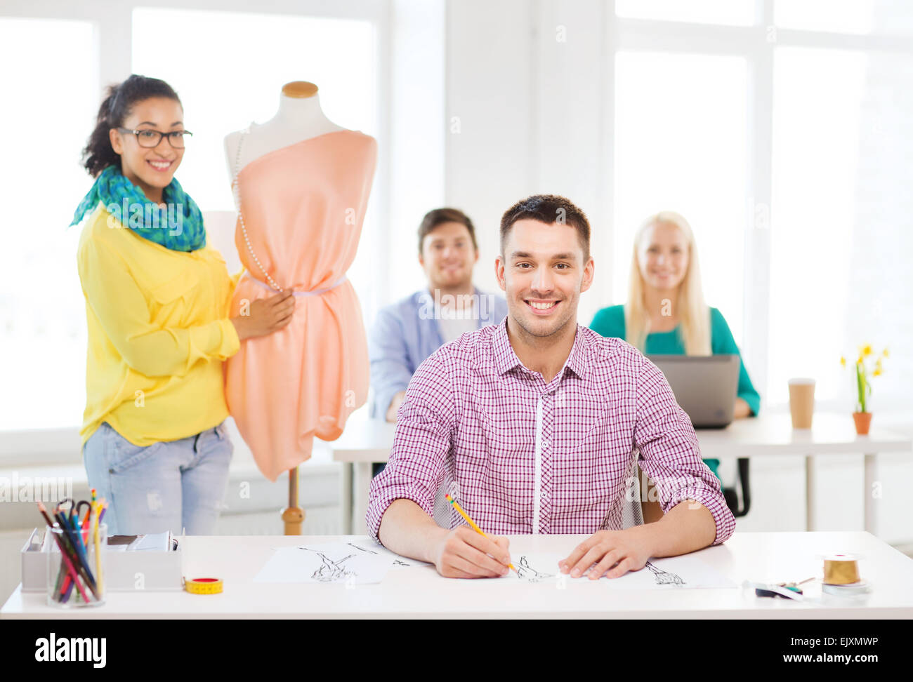 Female fashion designers drawing sketches hi-res stock photography and ...