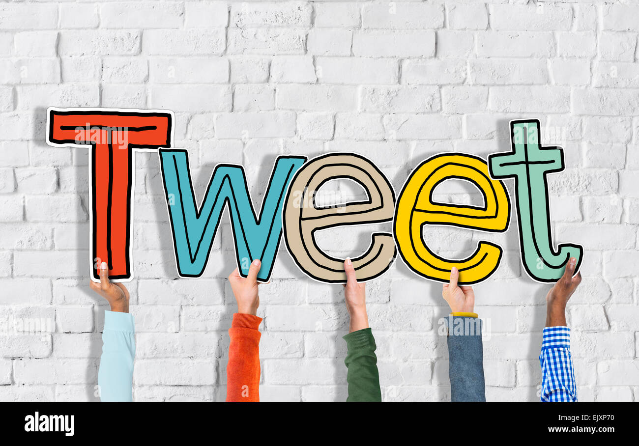 Group of Hands Holding Letter Tweet Stock Photo - Alamy