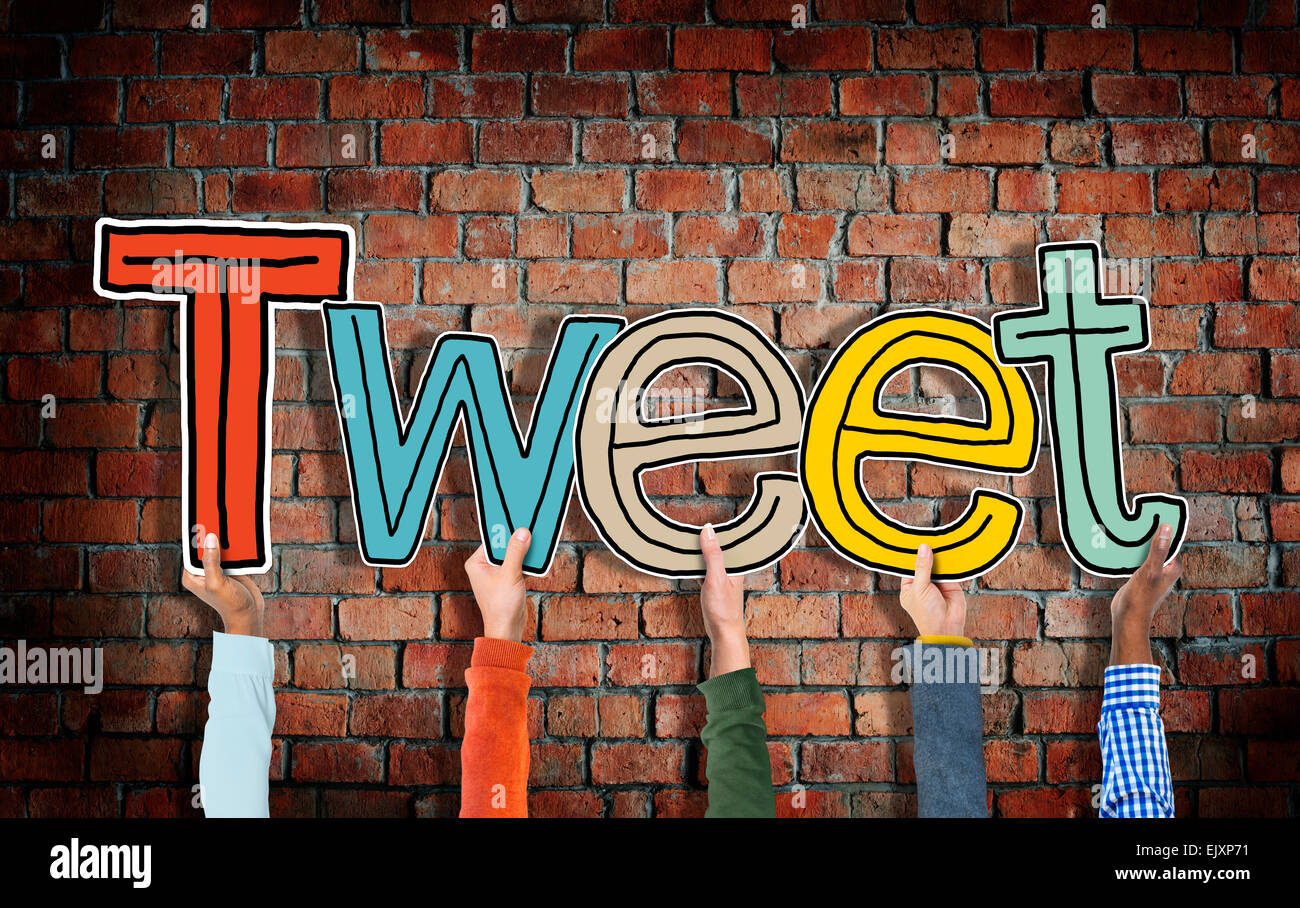 Group of Hands Holding Letter Tweet Stock Photo - Alamy
