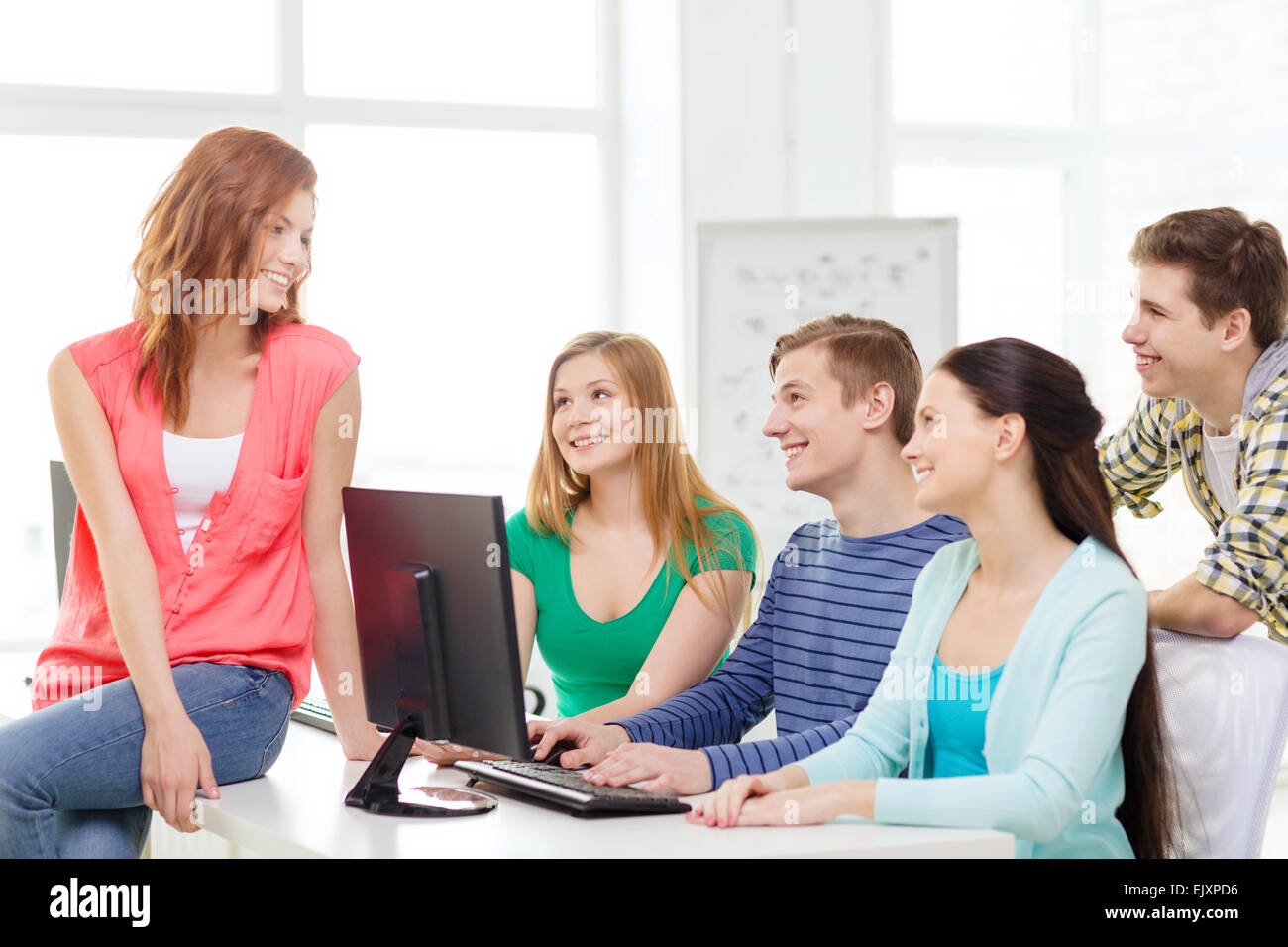 Student Discussion Bad group of smiling students having discussion Stock Photo - Alamy
