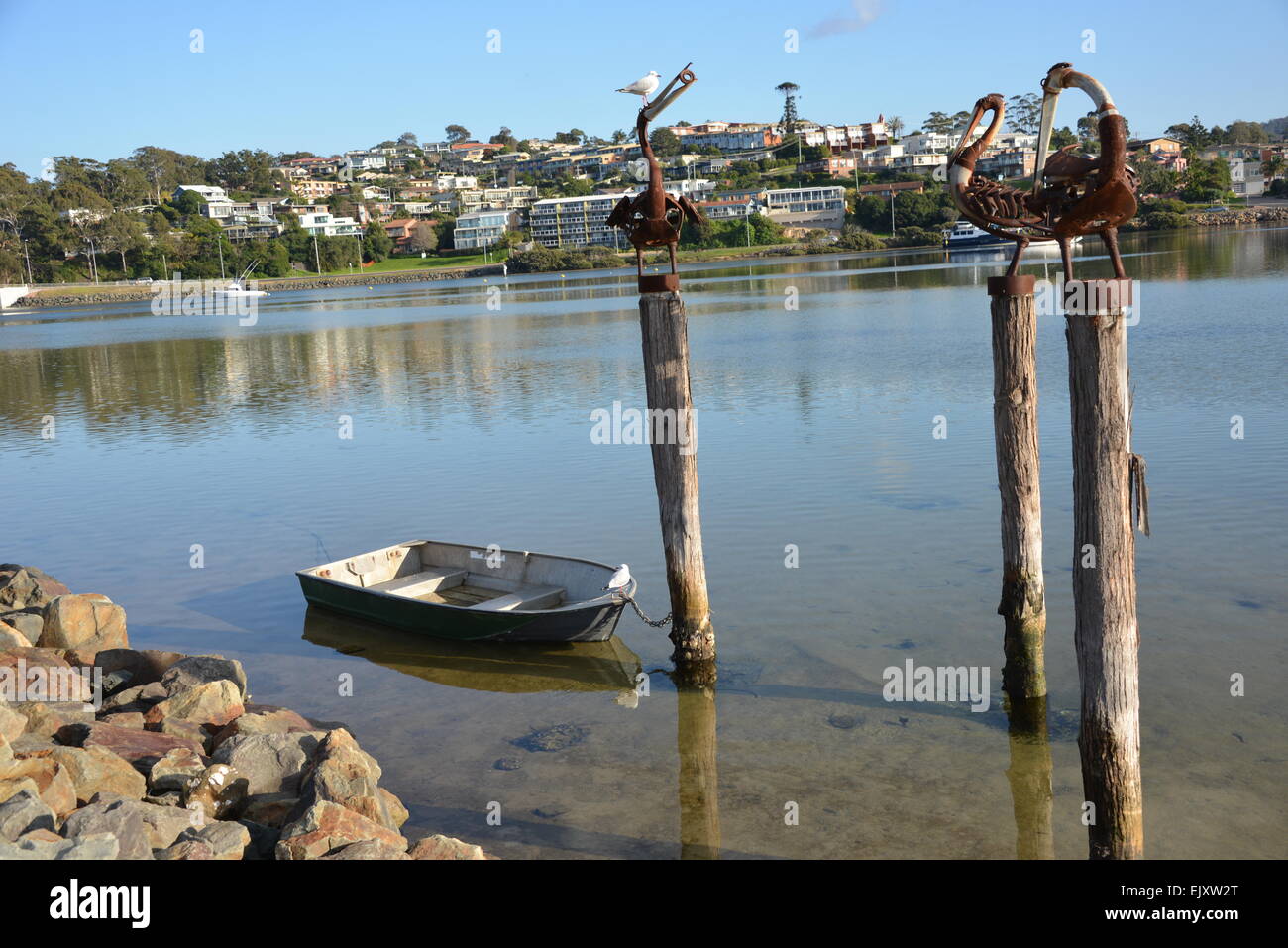 fishing coastal town Merimbula NSW sapphire coast lone fishing boat