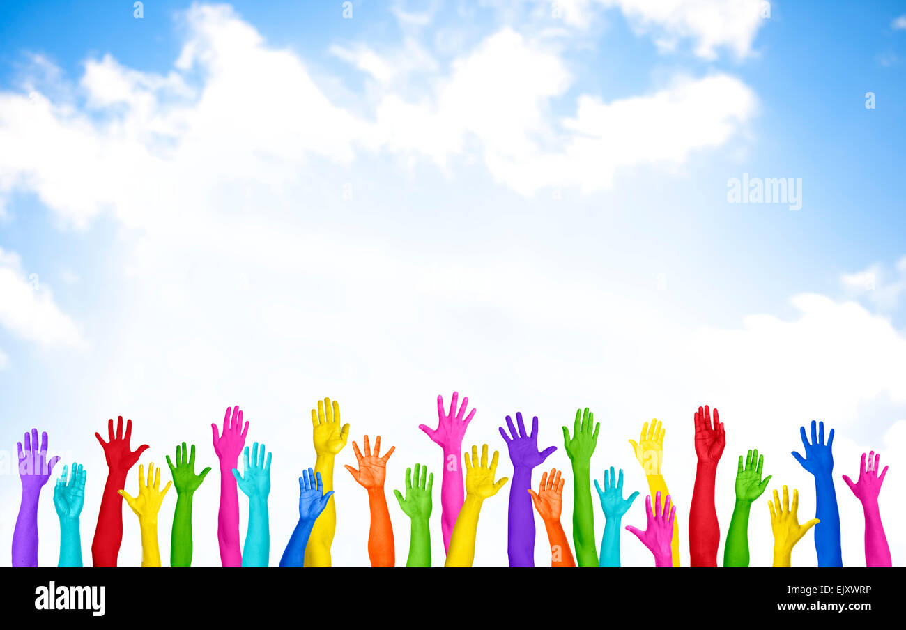Colorful Hands Raised With Blue Sky Stock Photo - Alamy