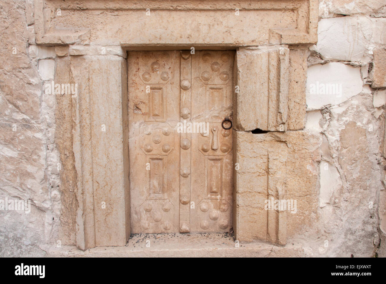 Israel. An ancient stone door in the 2000years old Jewish necropolis
