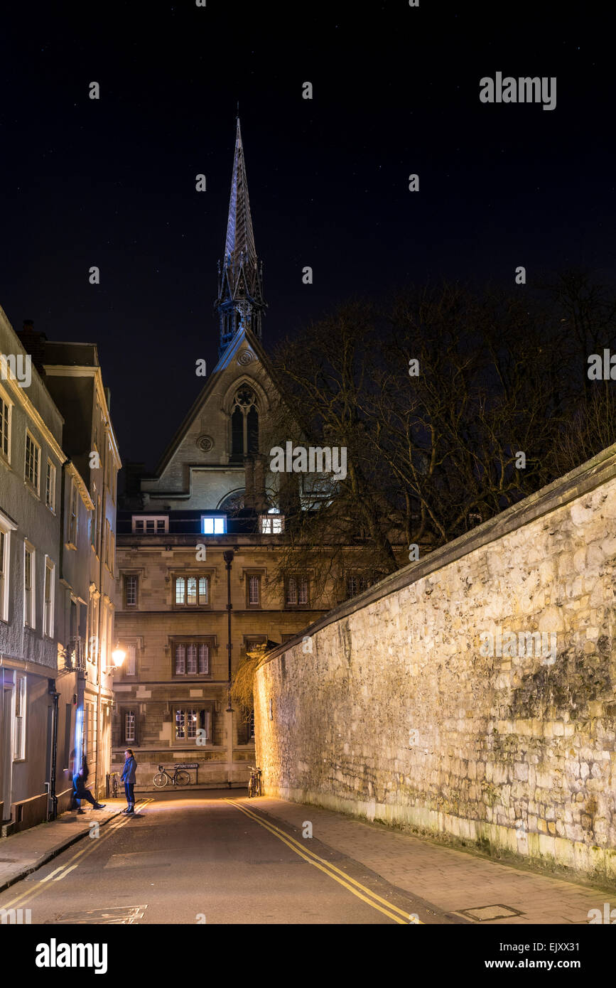 View down Ship Street to Exeter College chapel, part of Oxford University, seen here at night Stock Photo