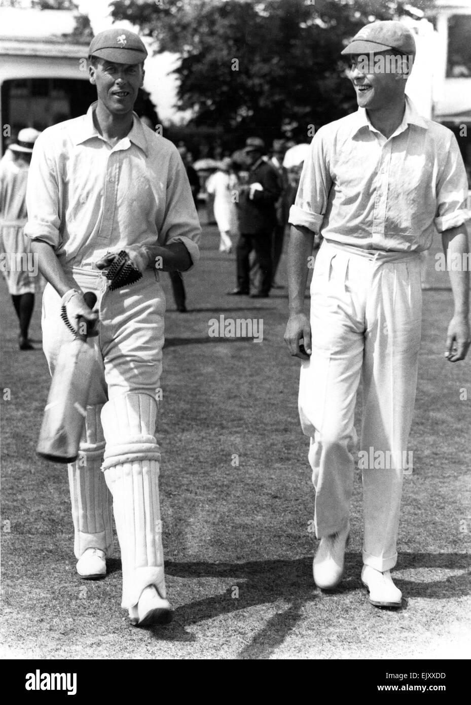 Kent v Middlesex at Canterbury. Frank Woolley of Kent on the left walks out to bat. 9th August 1923. Stock Photo