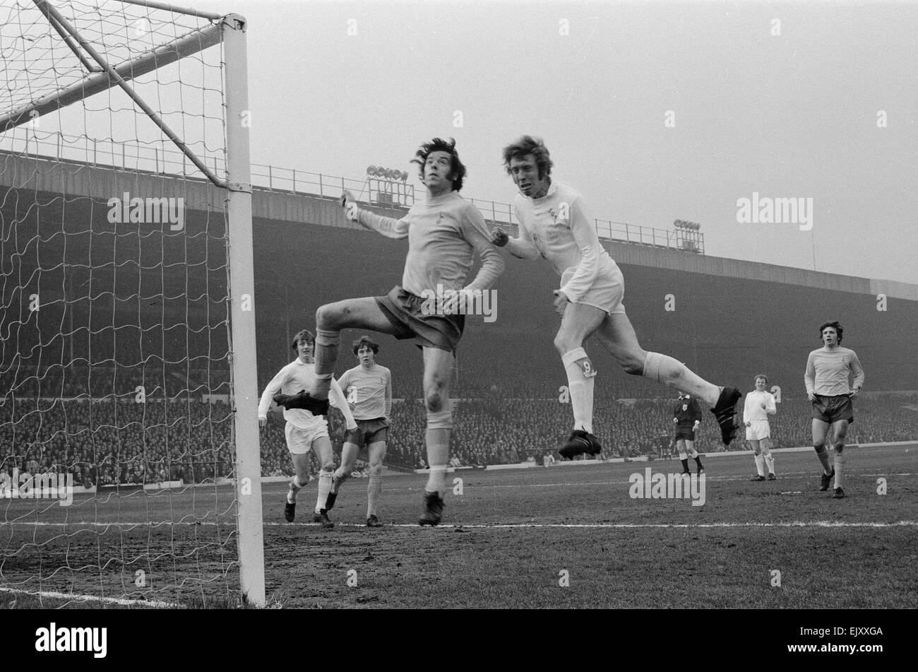 FA Cup Quarter Final match at Elland Road. Leeds United 2 v Tottenham Hotspur 1. Leeds' Mick Jones jumps up for a high ball with a Spurs defender. 18th March 1972.  *** Local Caption *** Allan Clarke Stock Photo
