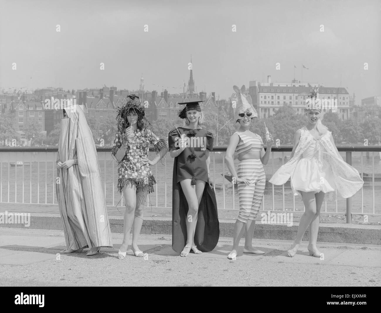 Reveille Models modelling the latest in beach wear fashions on the banks of the River Thames. Circa May 1961 Stock Photo